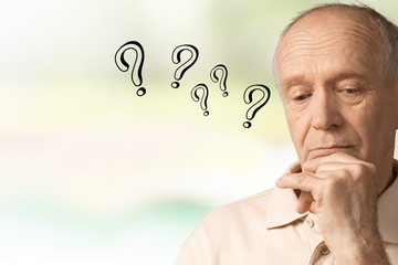 A senior old person with question marks