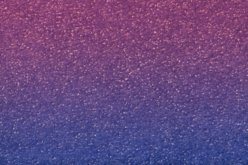 Texture of old dark navy blue paper with purple gradient, closeup. Structure of a laveder cardboard.