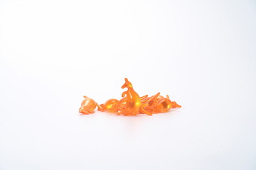 Fototapeta premium Colorful rabbits, kangaroos, pigs, and animal-shaped aromatic capsules are on a white background