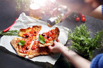 Thin crust pizza. A plate with an appetizing dish. Application suggestion. Culinary photography,...