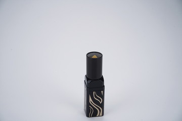 The black lipstick used by men is in the white background.