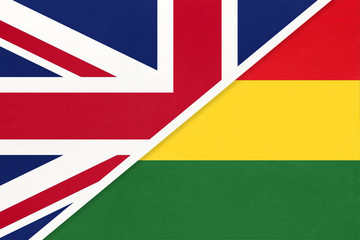 United Kingdom vs Bolivia national flag from textile. Relationship between two european and american countries.