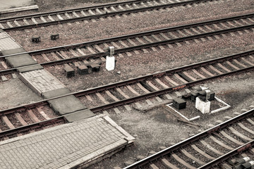 Empty railroad tracks near the train station