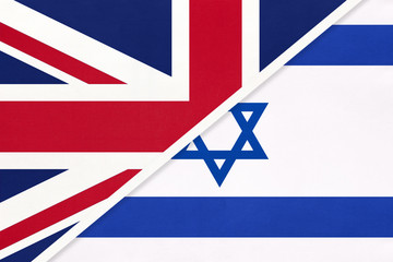 United Kingdom vs Israel national flag from textile. Relationship between two european and asian countries.