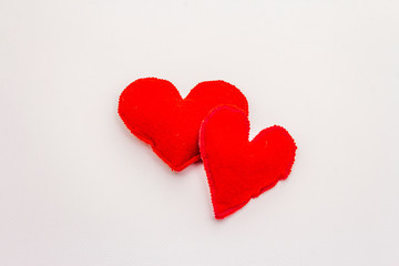Red felt hearts isolated on white background. Valentines Day or Wedding romantic concept