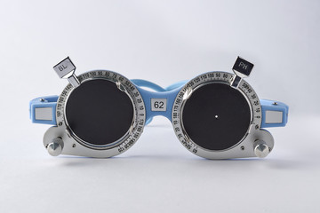 Optometrist medical equipment of pinhole on trial frame test, Equipment tool for test vision isolated on white background. © Nanda