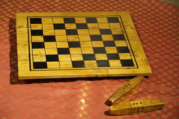 Vintage set of Parcheesi game of dice played in the epic poem Mahabharata. Set is made of wax and displayed at Kochi airport. Kochi India - March 2020