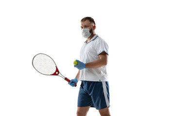 Win points off disease. Male tennis player in protective mask, gloves. Prevention against pneumonia. Still active while quarantine. Chinese coronavirus treatment. Healthcare, medicine, sport concept.