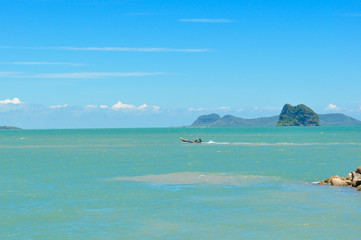 beautiful soft wave clear blue transparency sea ocean water and rocks at the bottom of the tropical paradise beach coast summer sea view at PP Island, Krabi, Phuket, Thailand.