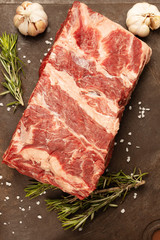 A piece of beef meat, raw, tasty and juicy steak before cooking