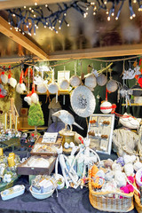 White handmade souvenirs on the stall at Riga Christmas Market