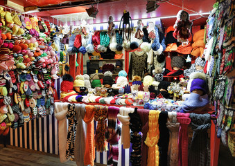 Fototapeta na wymiar Colorful wool clothes at Riga Street Christmas Market