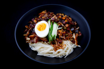 Jajangmyeon, noodle dish topped with black sauce