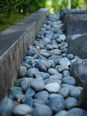 Gravel road beside the stairs