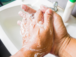 Clean hands with soap to eliminate viruses.