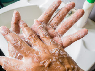 Clean hands with soap to eliminate viruses.