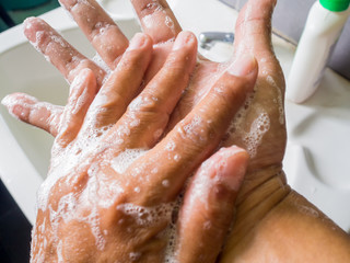 Clean hands with soap to eliminate viruses.