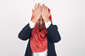 Exasperate female keeps hands on temples, feels strong headache, closes eyes with pain, need...