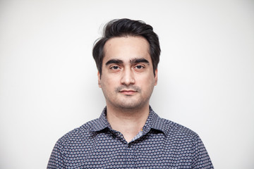Fototapeta premium Middle East Asian man dressed casually for office work.