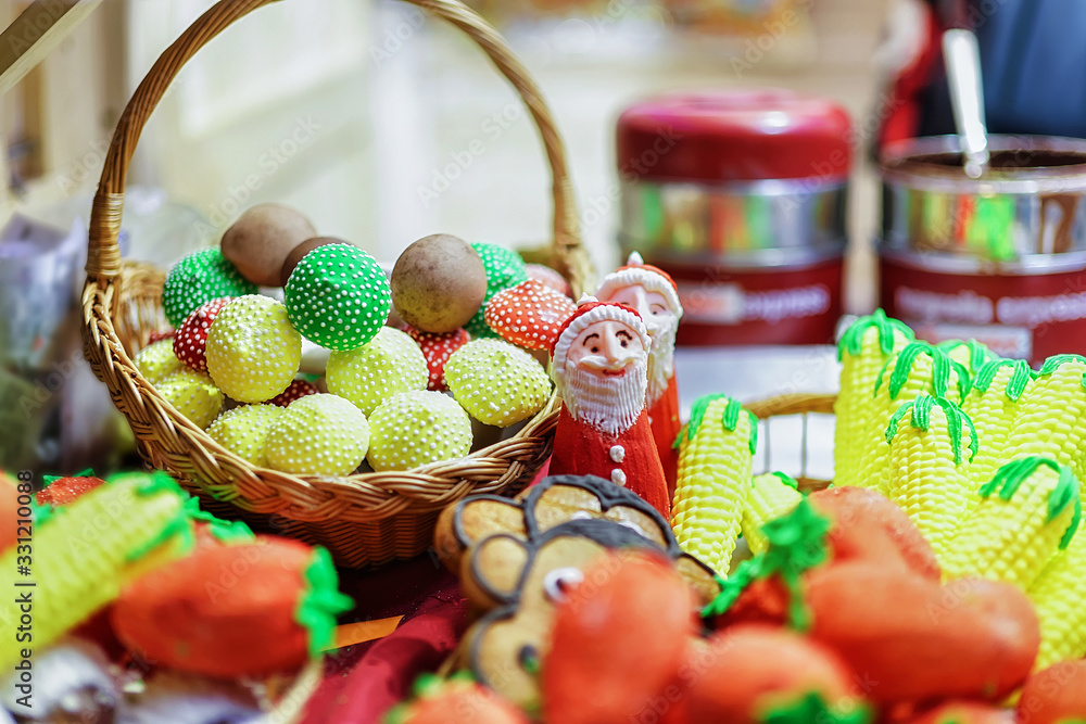 Poster Stall with colorful sweets in the Christmas Market Vilnius