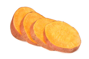 Sweet potatoes with slices isolated on a white background