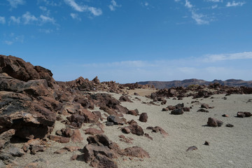 Fototapeta na wymiar Rocky volcanic landscape of caldera in Teide national park, Tenerife island