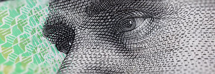 Macro Photography of the eyes of AB 'Banjo' Paterson on the 10 Dollar Australia banknote. Extreme close up to a Australian 10 dollars note. Polymer currency of the Reserve Bank of Australia