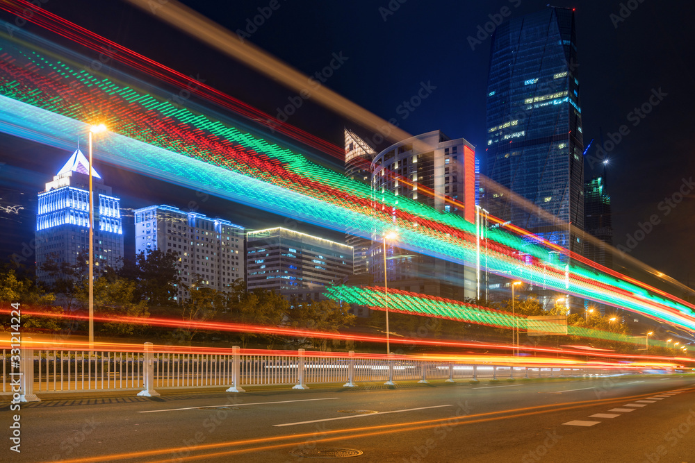 Poster abstract image of blur motion of cars on the city road at night