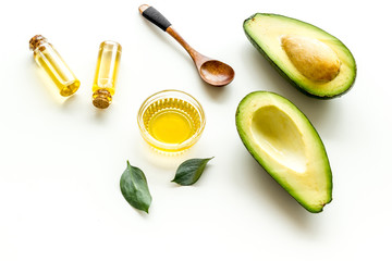 Avocado oil - ingredient for cosmetics - on white background