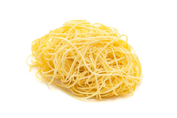 Fresh uncooked capellini pasta isolated on a white background