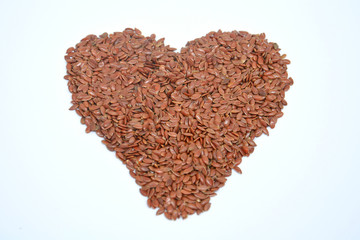 Linum usitatissimum is scientific name of Brown Flax seed. Also known as Linseed, Flaxseed and Common Flax. Pile of grains