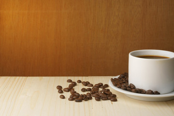 coffee cup with coffee beans. free copy space for your text