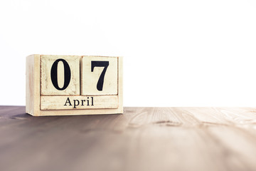 April 7th, fourth month of the clendar - copy space for text next to April symbol