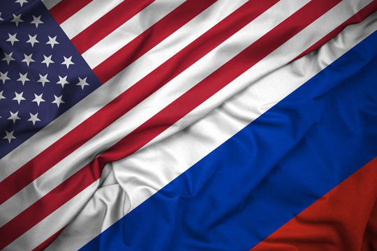 Close Up Flag of United States of America (USA) and Russia. Economic Diplomacy, Global Trade, Relationship and Chess Rivalry  Concept. Silk Fabric, Detailed Texture. Horizontal Background