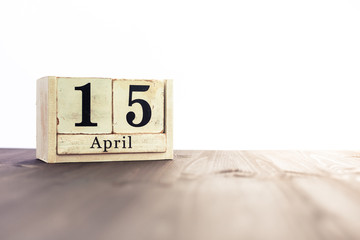 April 15th, fourth month of the clendar - copy space for text next to April symbol
