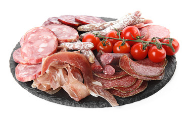 Slices of different sausages with tomatoes isolated on white