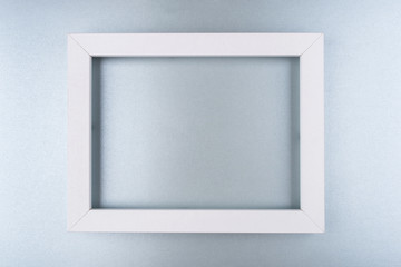 White text frame on a silver background. Copy space for text.