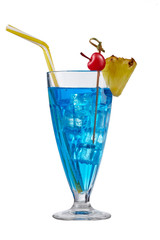 Blue Lagoon cocktail with ice cubes is contained in milkshake glass with pineapple slice on the rim, a straw and a cherry on the stick. The showy illustrative picture is made on the white background.