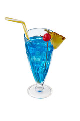 Blue Lagoon cocktail with ice cubes is contained in milkshake glass with pineapple slice on the rim, a straw and a cherry on the stick. The showy illustrative picture is made on the white background.