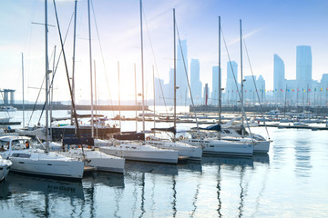 Fototapeta premium Sailing boats dock at the Olympic Sailing Center Pier in Qingdao, China