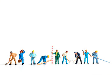 Worker team standing on white background and copy space for your text , Labour day concept - obrazy, fototapety, plakaty