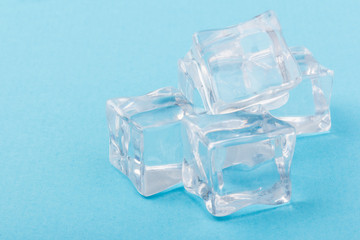 ice cubes in close-up on blue background