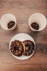 Obraz na płótnie Canvas americano and chocolate donuts