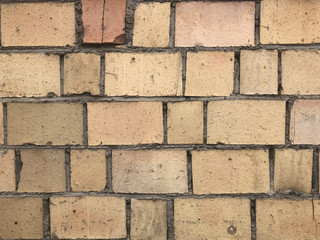 Yellow brick wall texture for pattern and background.