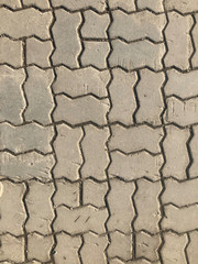 Sidewalk texture of rectangular blocks for pattern and background.