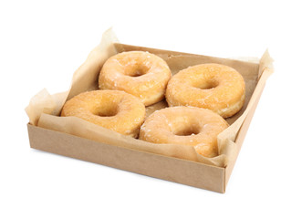 Delicious donuts in box isolated on white