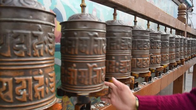 Buddhist  's  tibetan's prayer wheels  in Kathmandu, Napal