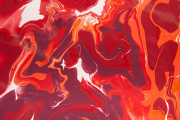 Handmade marble background texture of red paints