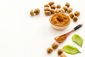 Nutmeg - still life with asian spices - on white background copy space