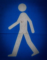 White stick man on a blue background